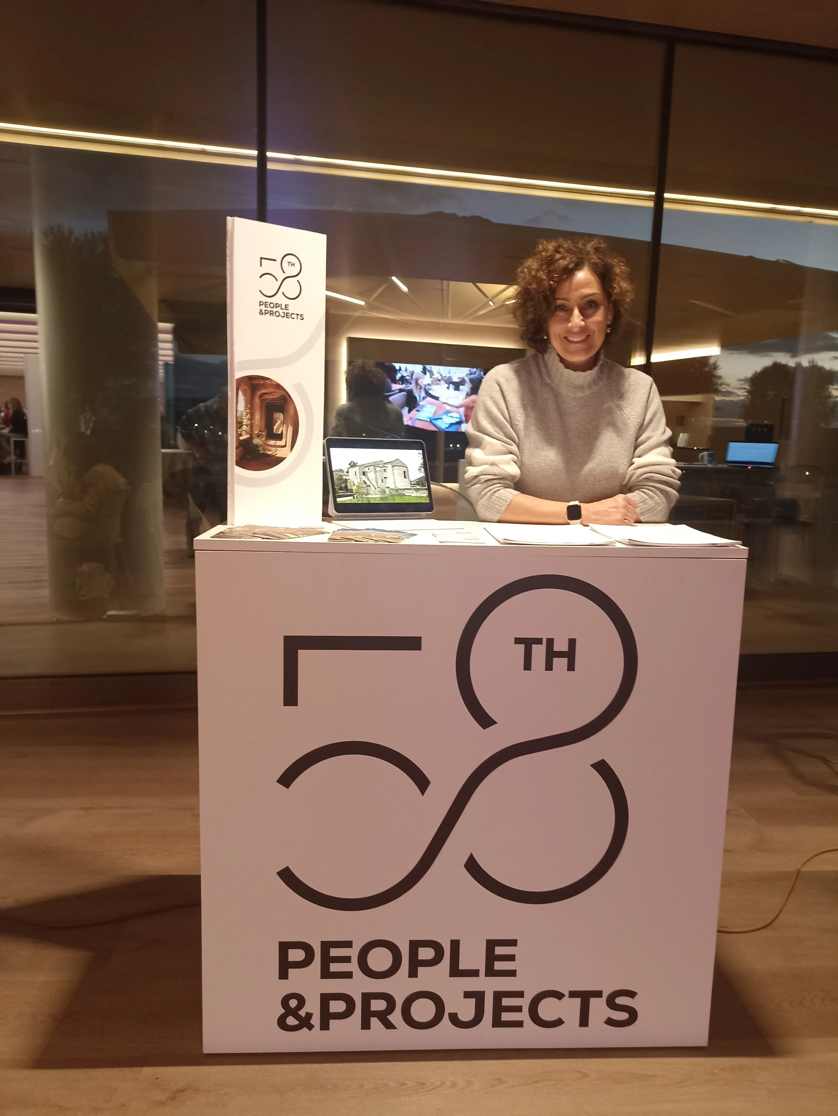 Cinzia Perlingieri behind the 58th People & Projects branded podium at a cultural-sector networking event